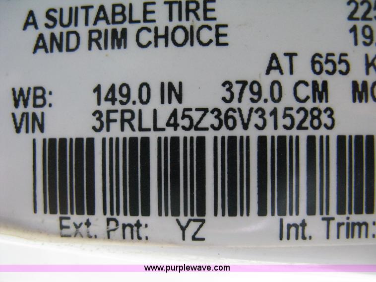 image for item A4297 2006 Ford LCF L45 flatbed utility truck