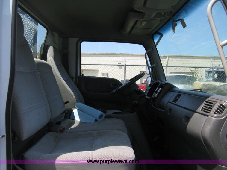 image for item A4297 2006 Ford LCF L45 flatbed utility truck