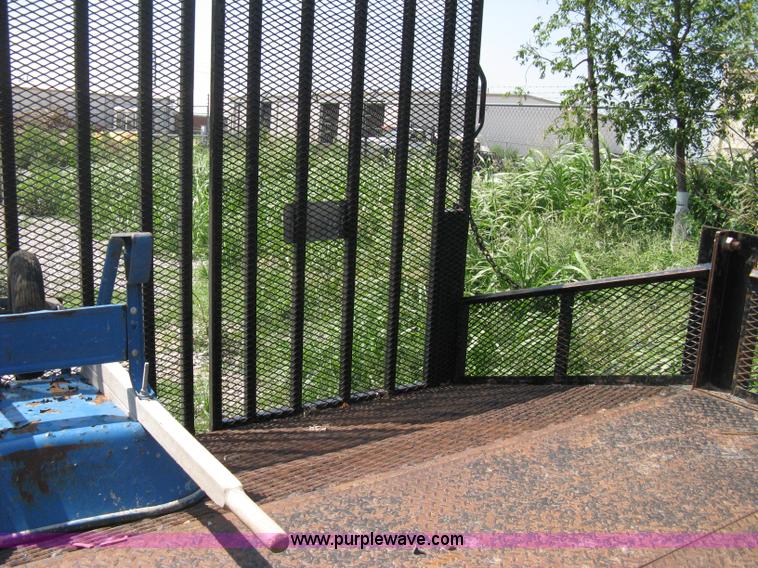 image for item A4297 2006 Ford LCF L45 flatbed utility truck