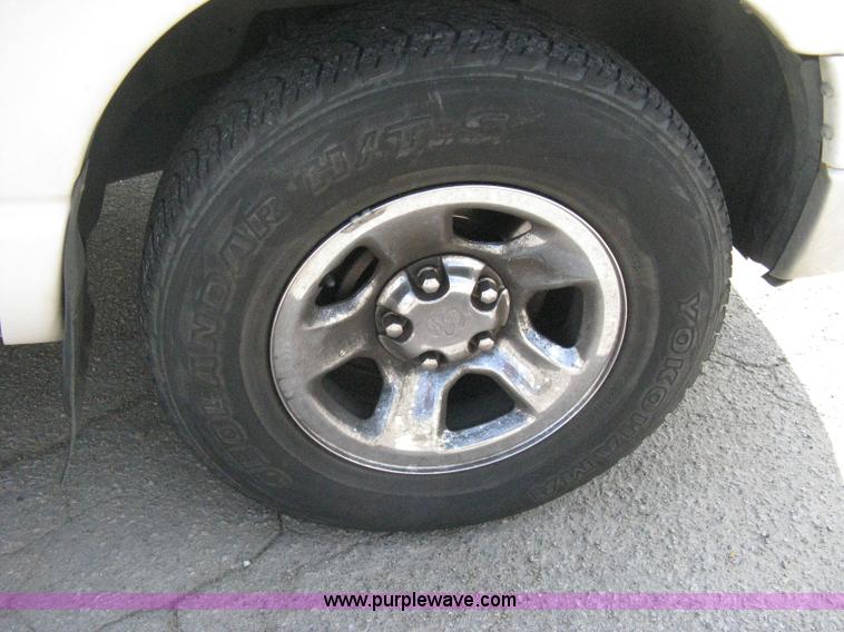 image for item A4299 2002 Dodge Ram 1500 SLT quad cab pickup truck