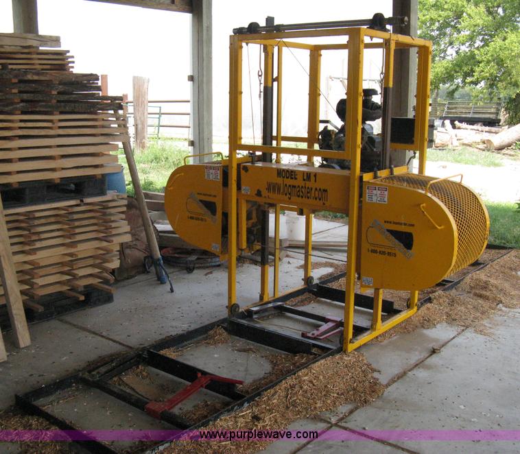 image for item B9532 Log Master LM1 portable band saw sawmill