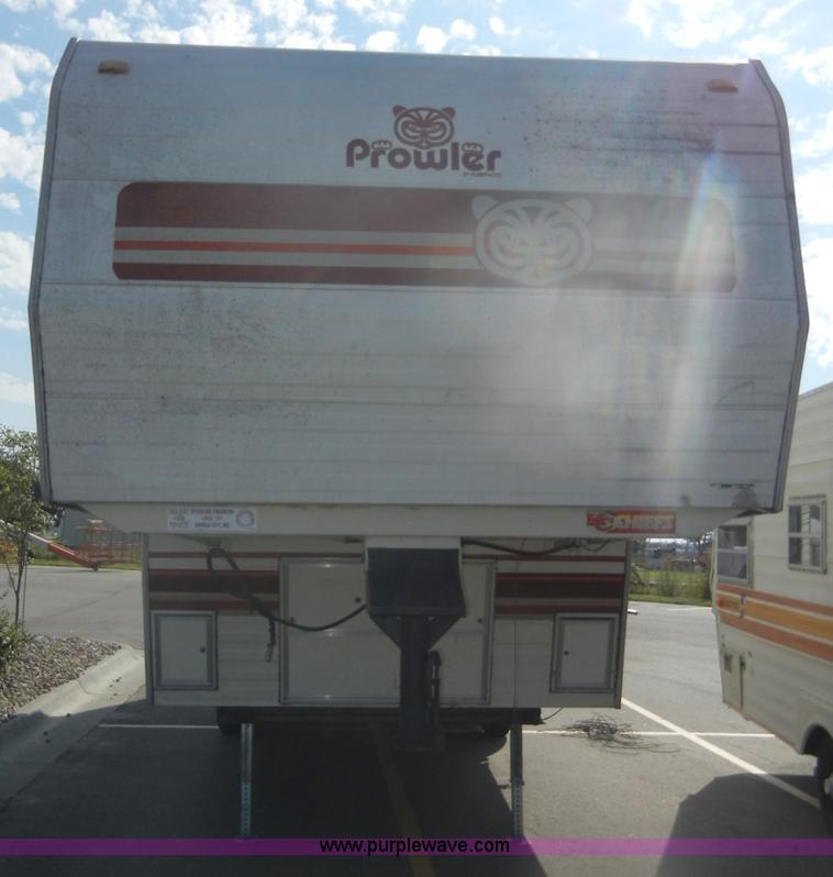 image for item D9752 1986 Fleetwood Prowler 30' fifth wheel camper
