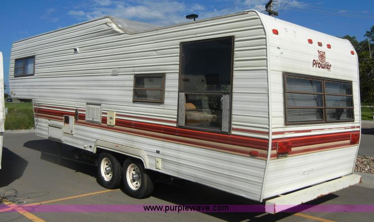image for item D9752 1986 Fleetwood Prowler 30' fifth wheel camper