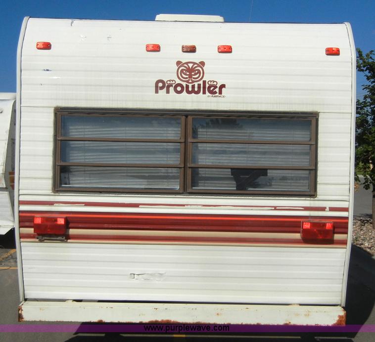 image for item D9752 1986 Fleetwood Prowler 30' fifth wheel camper