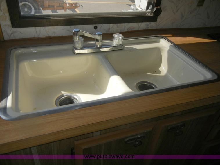 image for item D9752 1986 Fleetwood Prowler 30' fifth wheel camper