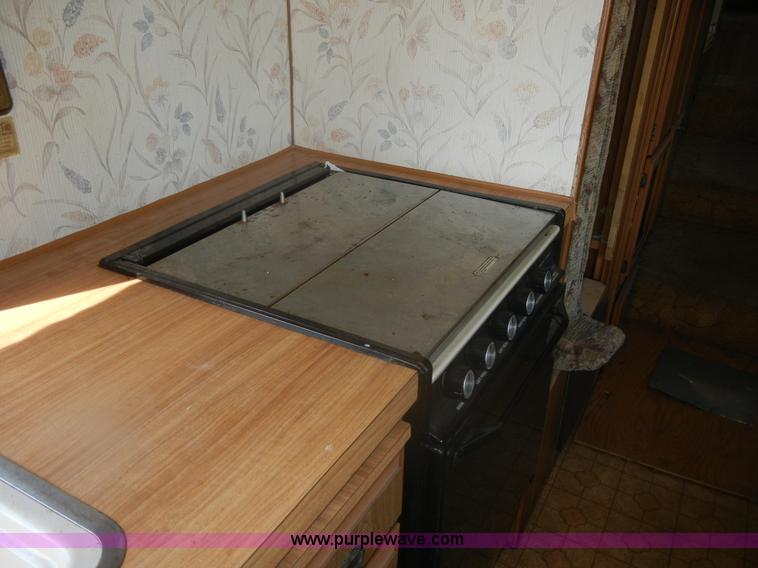 image for item D9752 1986 Fleetwood Prowler 30' fifth wheel camper