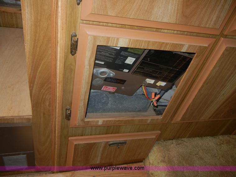 image for item D9752 1986 Fleetwood Prowler 30' fifth wheel camper