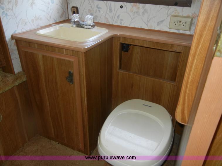 image for item D9752 1986 Fleetwood Prowler 30' fifth wheel camper