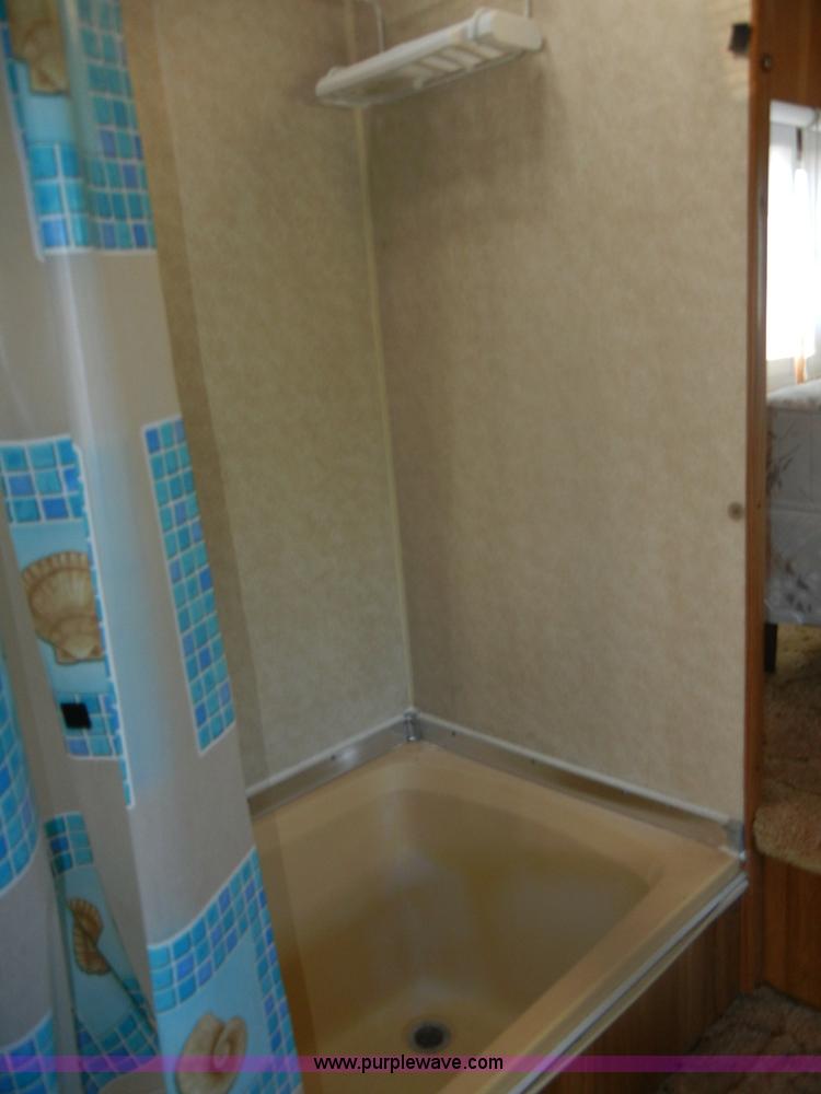 image for item D9752 1986 Fleetwood Prowler 30' fifth wheel camper