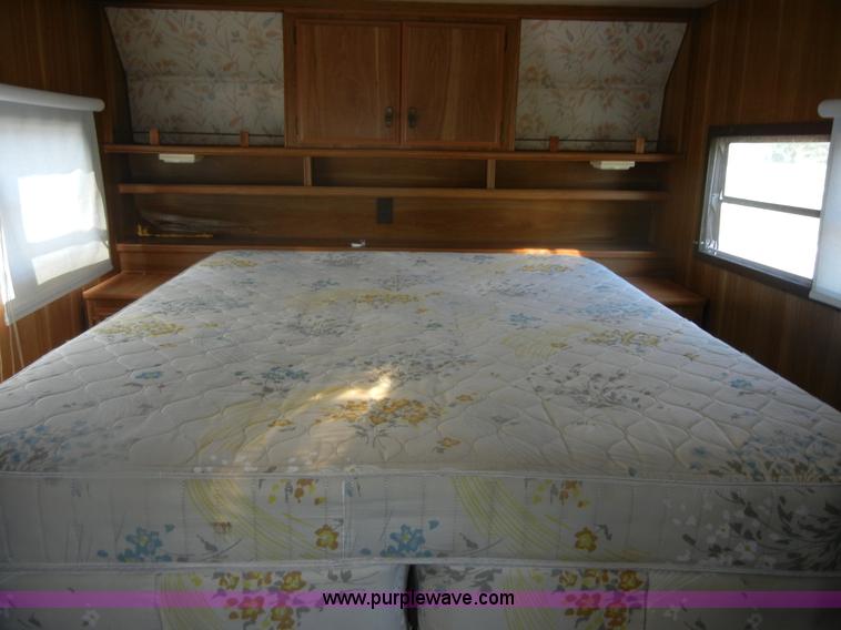 image for item D9752 1986 Fleetwood Prowler 30' fifth wheel camper