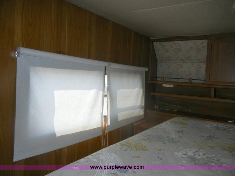 image for item D9752 1986 Fleetwood Prowler 30' fifth wheel camper