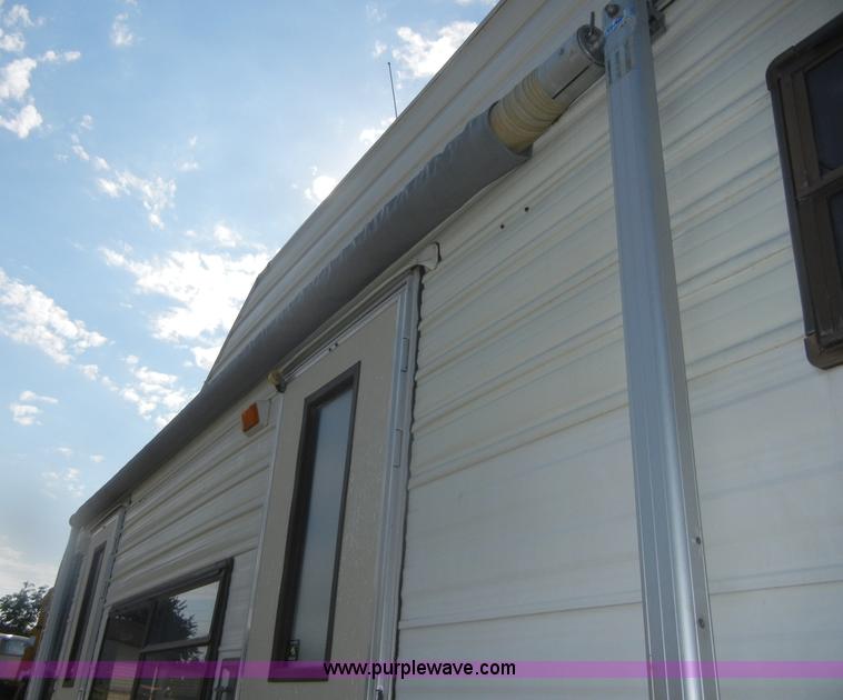 image for item D9752 1986 Fleetwood Prowler 30' fifth wheel camper