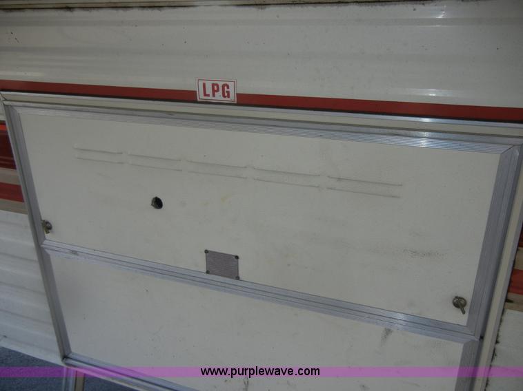 image for item D9752 1986 Fleetwood Prowler 30' fifth wheel camper