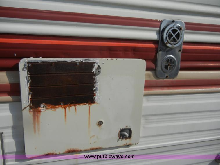 image for item D9752 1986 Fleetwood Prowler 30' fifth wheel camper