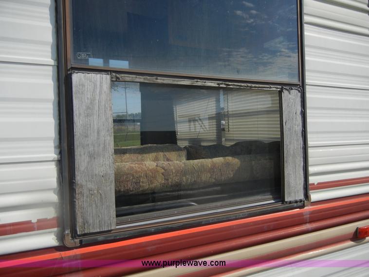 image for item D9752 1986 Fleetwood Prowler 30' fifth wheel camper