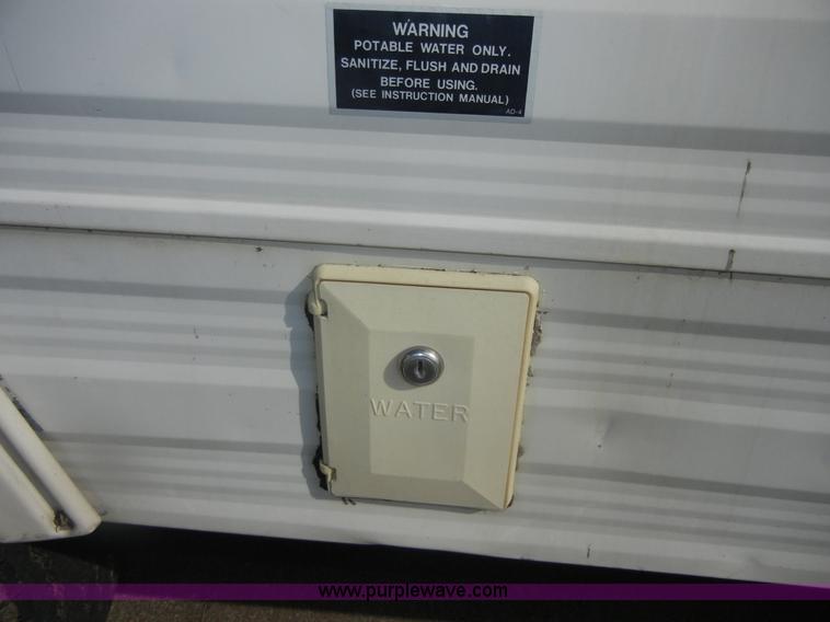 image for item D9752 1986 Fleetwood Prowler 30' fifth wheel camper