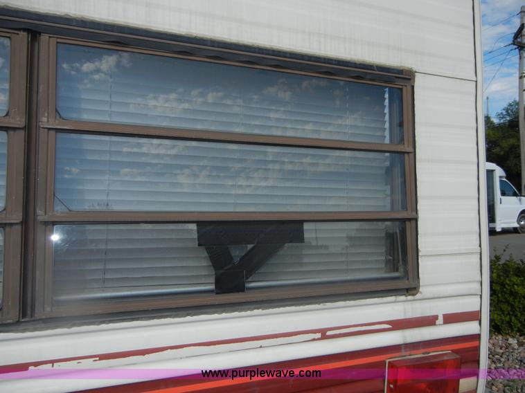 image for item D9752 1986 Fleetwood Prowler 30' fifth wheel camper