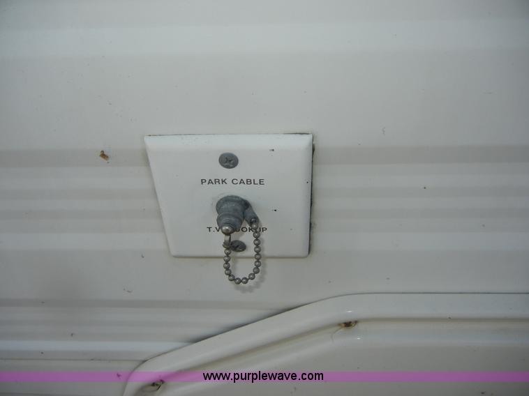 image for item D9752 1986 Fleetwood Prowler 30' fifth wheel camper