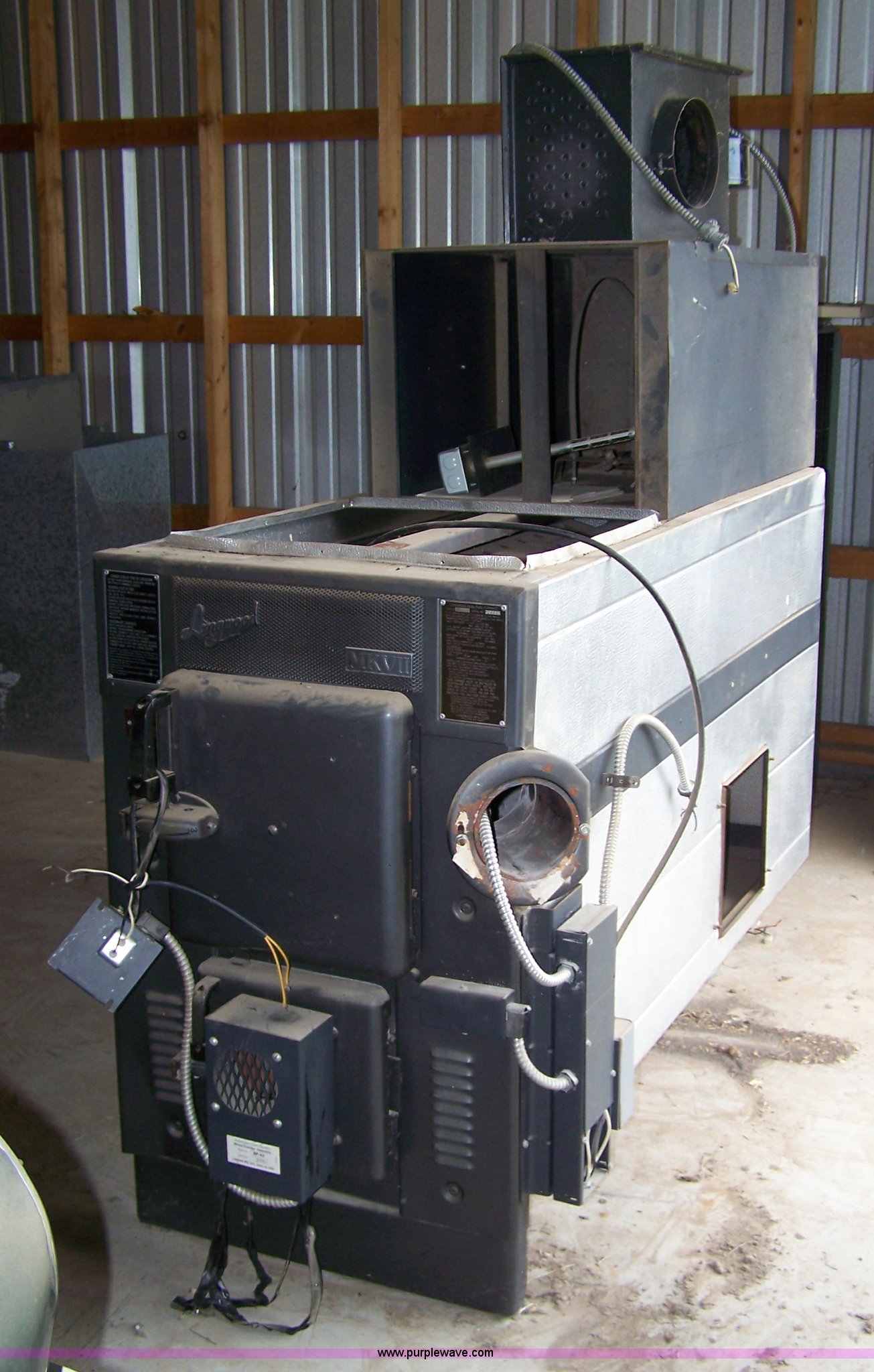Long wood dual fuel furnace in Ransom, KS | Item C9323 sold | Purple Wave