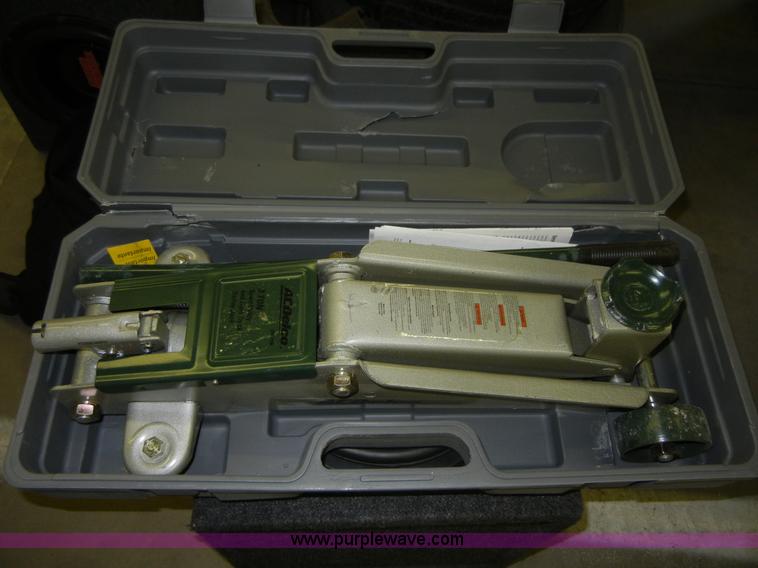 AC Delco 3 ton trolley jack with case in Junction City, KS Item D9548