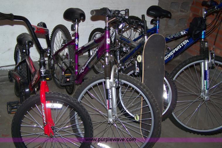 image for item C9341 (4) bicycles and a skateboard