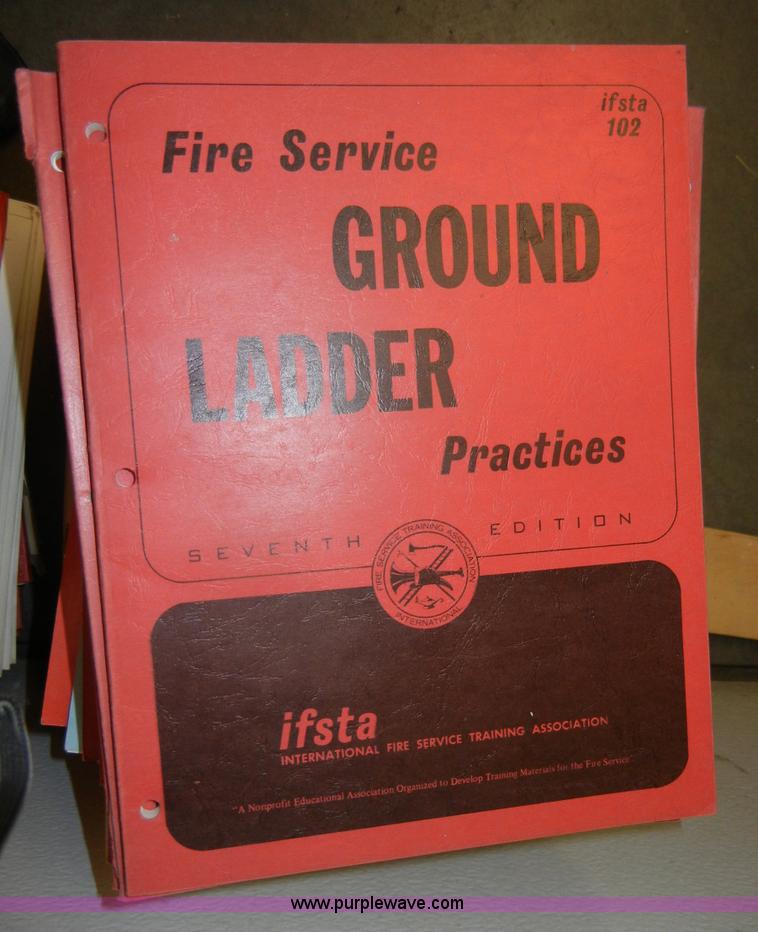 image for item D9575 Approximately 89 used fire fighter study guides and first aid guides