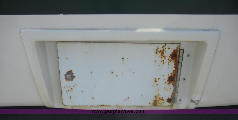 image for item D9805 2006 Ford E450 Super Duty transit bus