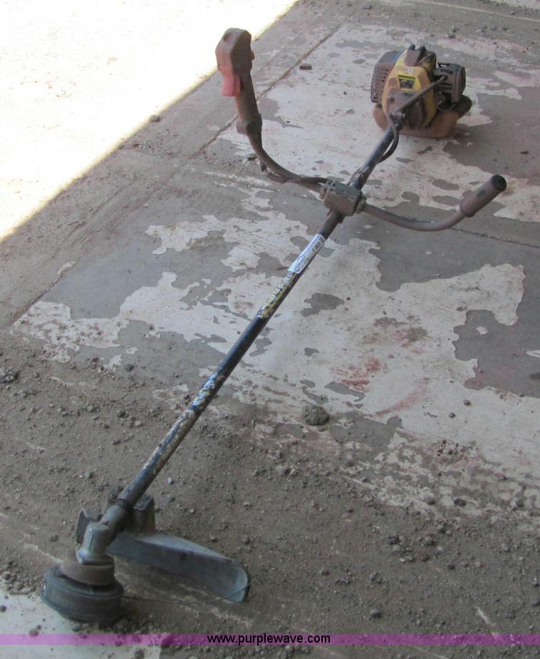 image for item F9820 John Deere XT1708 weed eater