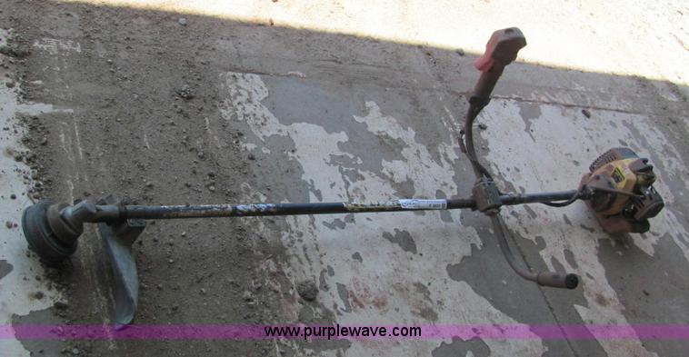 image for item F9820 John Deere XT1708 weed eater