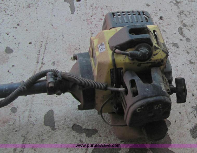 image for item F9820 John Deere XT1708 weed eater