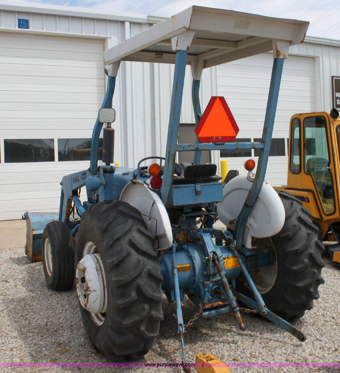Ford 420 tractor in Hutchinson, MO Item A2676 sold Purple Wave