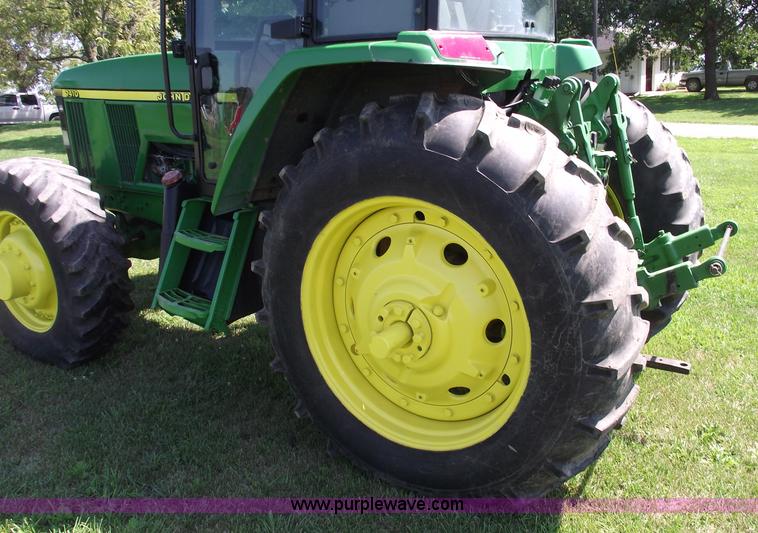 image for item A4055 2001 John Deere 7410 MFWD tractor