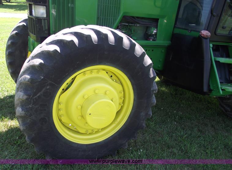 image for item A4055 2001 John Deere 7410 MFWD tractor