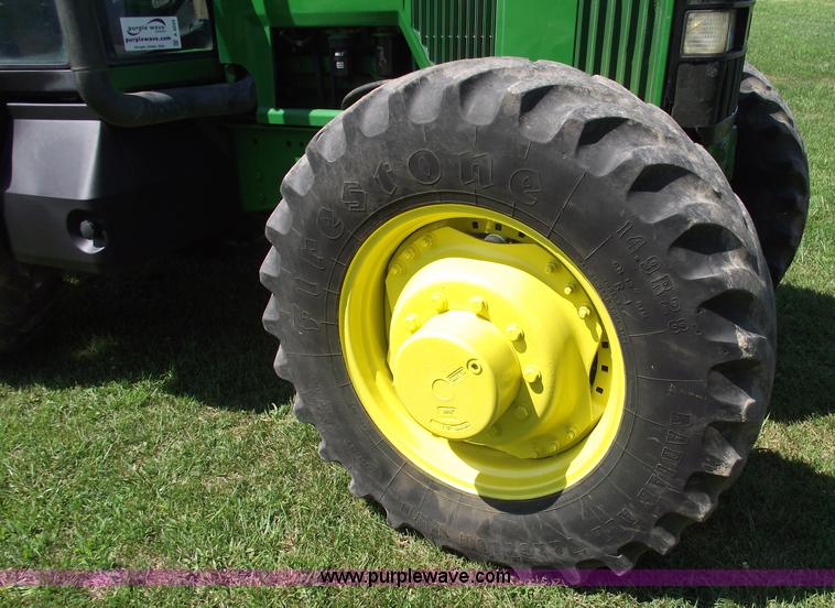 image for item A4055 2001 John Deere 7410 MFWD tractor
