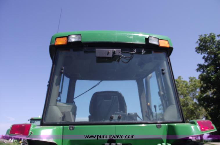 image for item A4055 2001 John Deere 7410 MFWD tractor