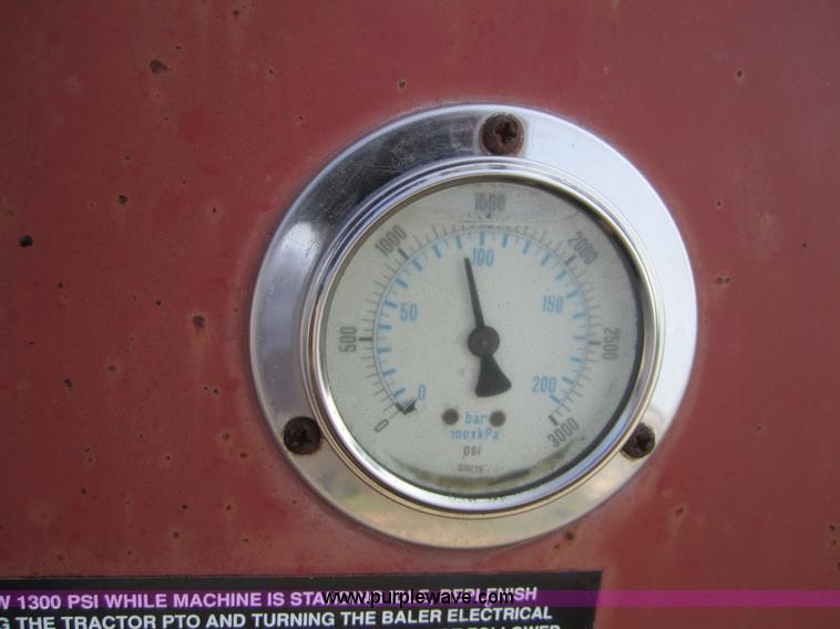 image for item A4707 1999 Case IH 8465A round baler