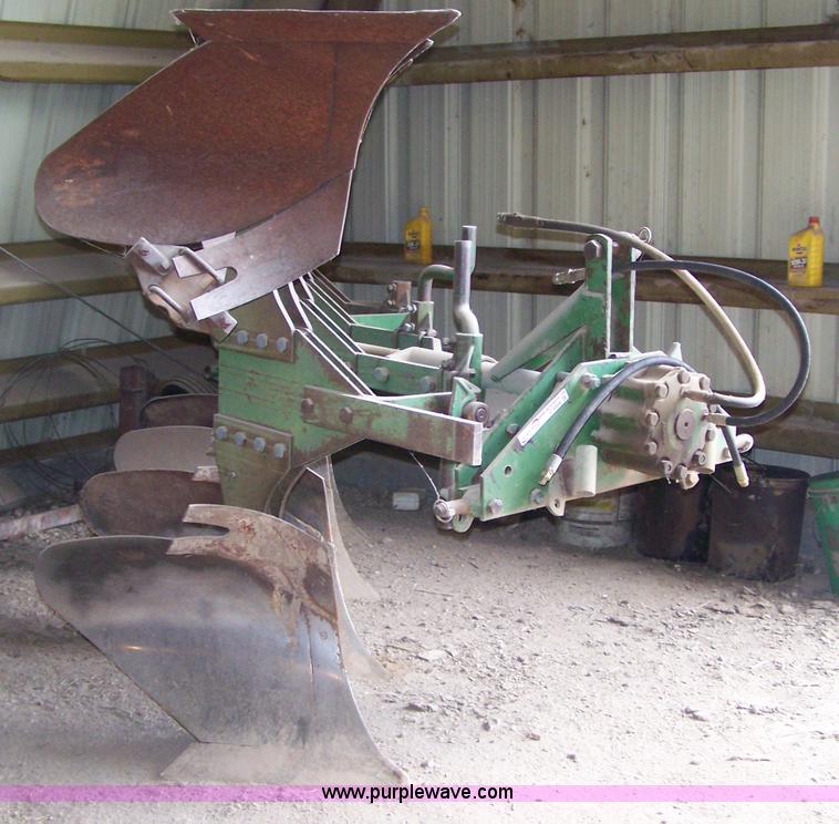 image for item C9334 John Deere four bottom rollover plow
