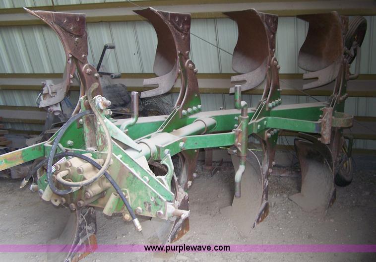 image for item C9334 John Deere four bottom rollover plow