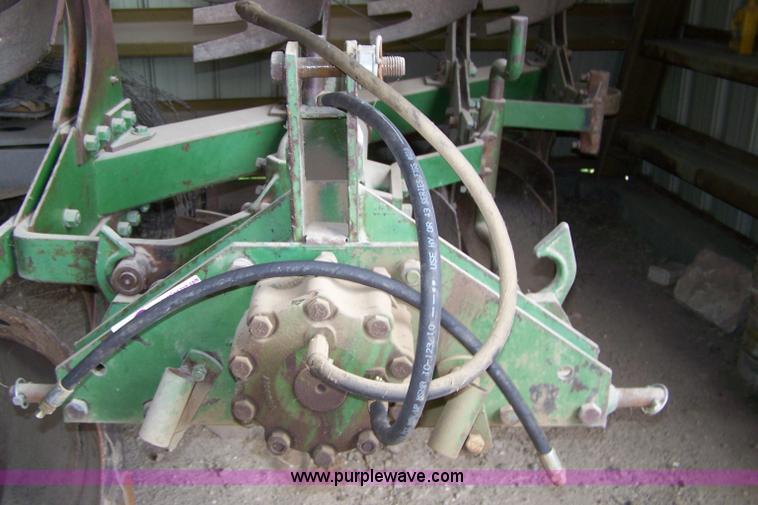 image for item C9334 John Deere four bottom rollover plow