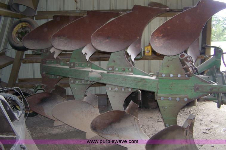 image for item C9334 John Deere four bottom rollover plow