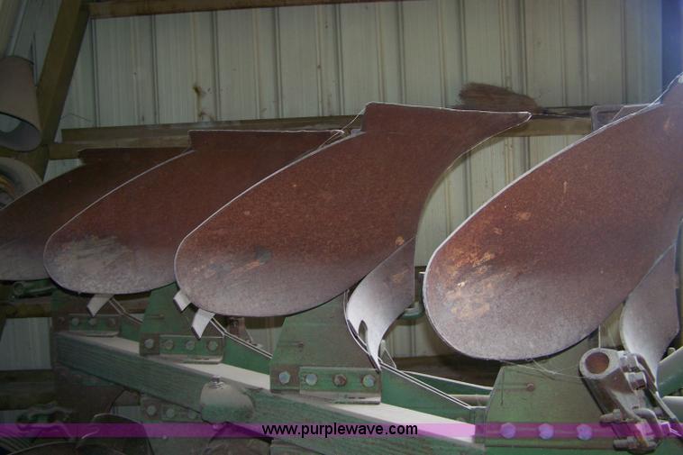 image for item C9334 John Deere four bottom rollover plow