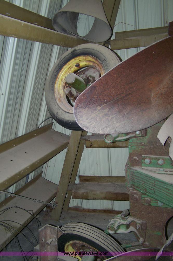 image for item C9334 John Deere four bottom rollover plow