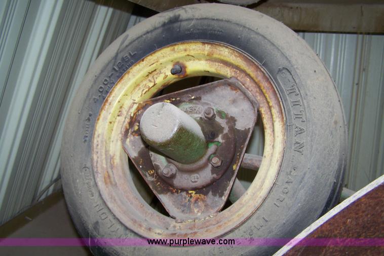 image for item C9334 John Deere four bottom rollover plow