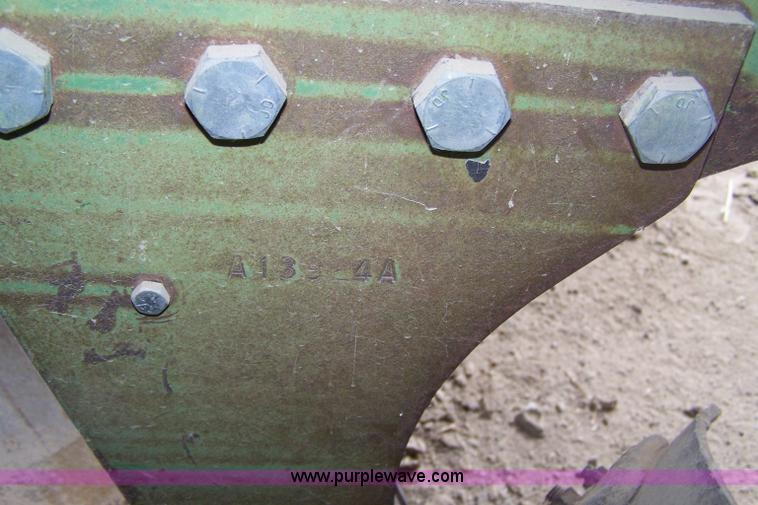 image for item C9334 John Deere four bottom rollover plow