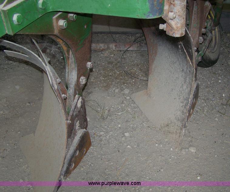 image for item C9334 John Deere four bottom rollover plow