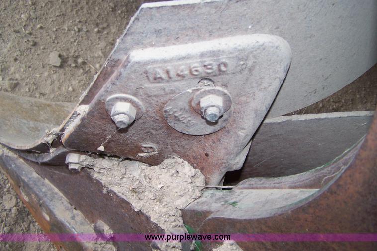 image for item C9334 John Deere four bottom rollover plow