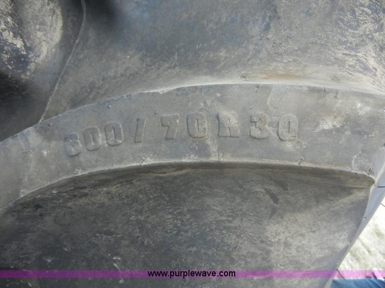 image for item D9733 Firestone tires and rims