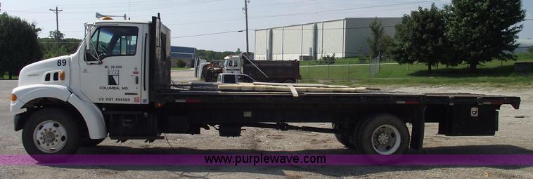 image for item A4034 1999 Sterling L7501 flatbed truck