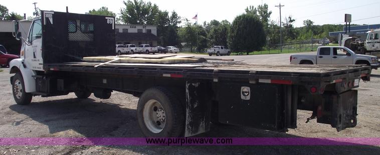image for item A4034 1999 Sterling L7501 flatbed truck