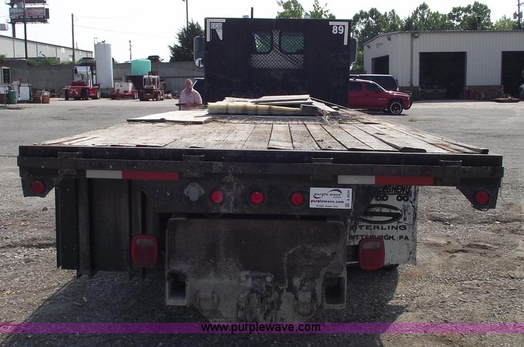 image for item A4034 1999 Sterling L7501 flatbed truck